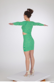 Jessie Clark casual dressed green long sleeve dress standing t-pose…